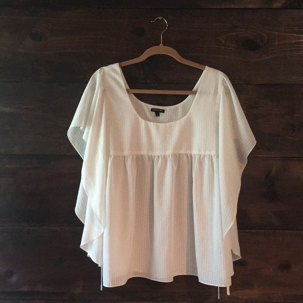 White flowy top